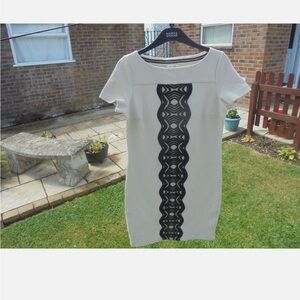 Boden cream and black appliqué dress.